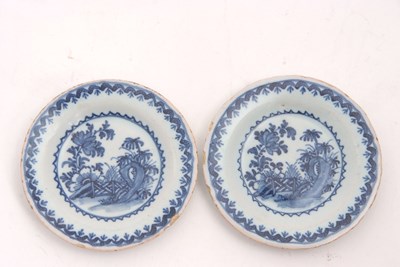 Lot 34 - An unusual pair of Delft miniature plates, the...