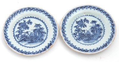Lot 34 - An unusual pair of Delft miniature plates, the...