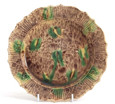 Lot 37 - A mid 18th Century cream ware plate with...