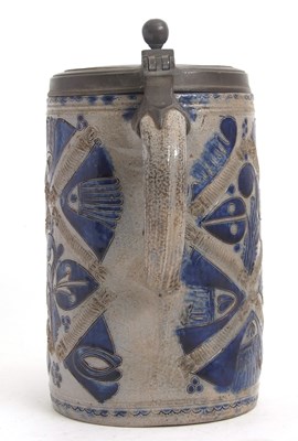 Lot 38 - A German pottery tankard or stein Westerwald...