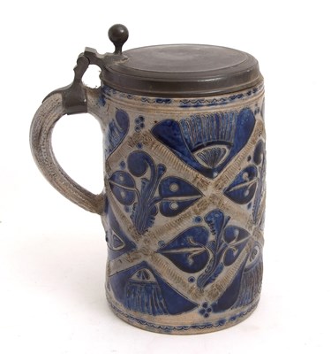 Lot 38 - A German pottery tankard or stein Westerwald...