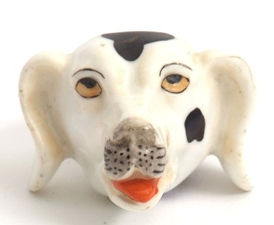 Lot 43 - A 19th Century Staffordshire dog whistle,...