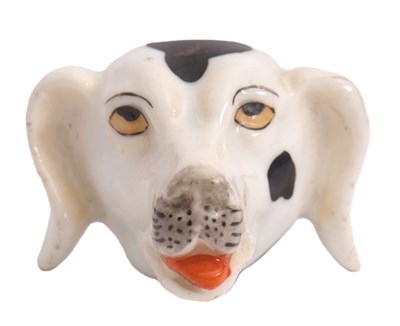 Lot 43 - A 19th Century Staffordshire dog whistle,...