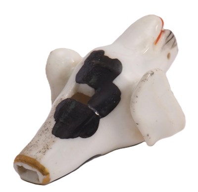 Lot 43 - A 19th Century Staffordshire dog whistle,...