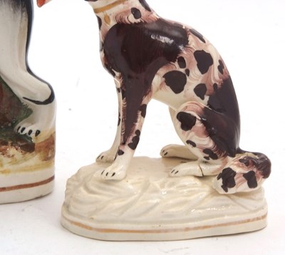 Lot 48 - A Staffordshire model of a greyhound with...