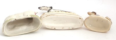 Lot 48 - A Staffordshire model of a greyhound with...