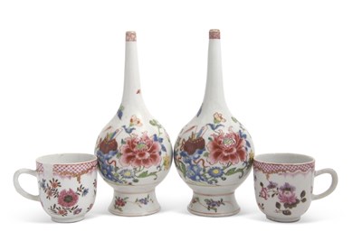 Lot 59 - A pair of bottle shaped vases with Famille...
