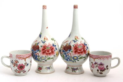 Lot 59 - A pair of bottle shaped vases with Famille...