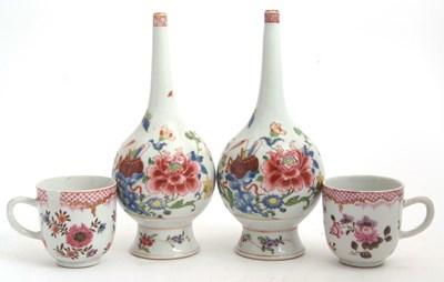 Lot 59 - A pair of bottle shaped vases with Famille...