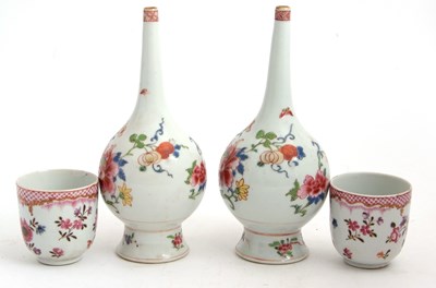 Lot 59 - A pair of bottle shaped vases with Famille...