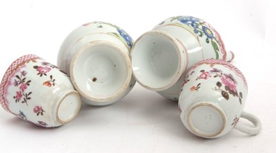 Lot 59 - A pair of bottle shaped vases with Famille...