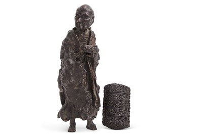 Lot 62 - A Chinese carved root wood figure, possibly...