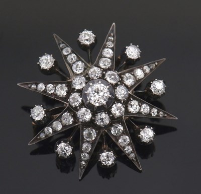 Lot 383 - A Victorian diamond star brooch, set...