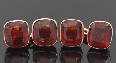 Lot 421 - A pair of hessonite garnet cufflinks, each...
