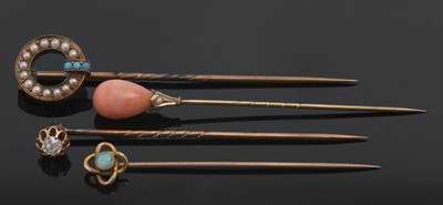 Lot 395 - Four antique stick pins: to include an...