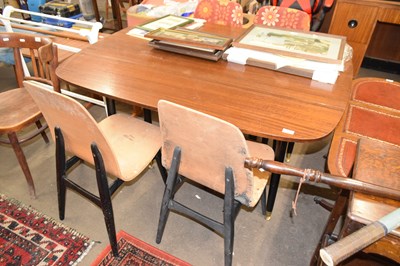 Lot 786 - A retro G-Plan drop leaf dining table and four...