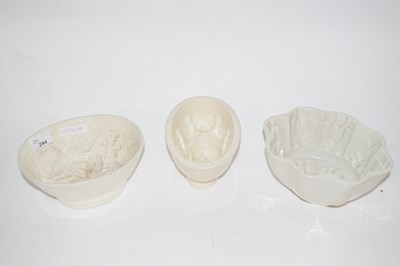 Lot 287 - A group of three ceramic jelly moulds...