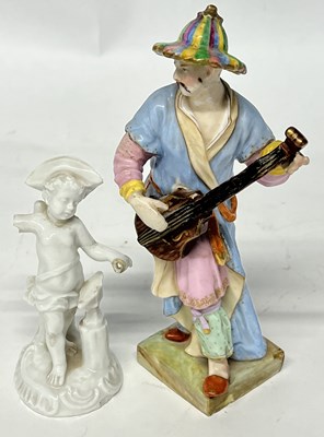 Lot 307 - A small blanc de chine model of a putto at...