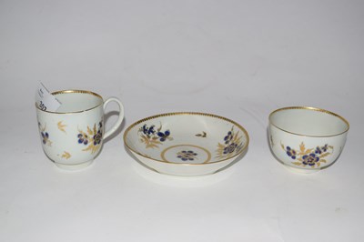 Lot 335 - A Worcester porcelain trio with blue and gilt...