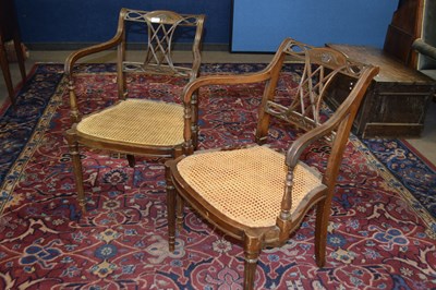 Lot 398 - A pair of Georgian Revival cane seated...