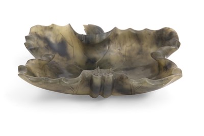 Lot 245 - A Spinach green jade Lotus dish, probably Qing...