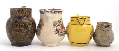Lot 70 - Four 19th Century Staffordshire pottery jugs...