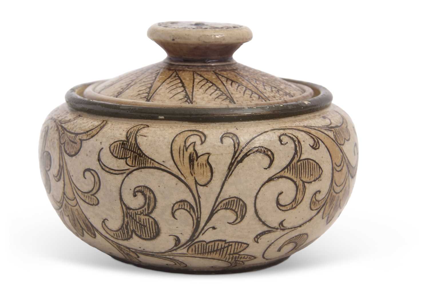 Lot 73 - A small Martinware bowl and cover with an...