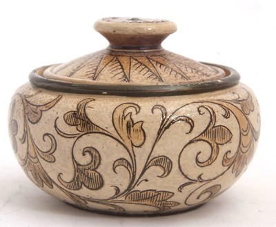 Lot 73 - A small Martinware bowl and cover with an...