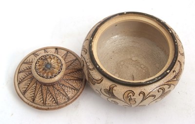 Lot 73 - A small Martinware bowl and cover with an...