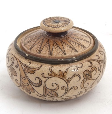 Lot 73 - A small Martinware bowl and cover with an...