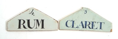 Lot 75 - Two wine/spirit labels with Delft type glaze,...