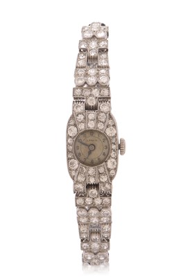 Lot 359 - A precious metal and diamond ladies cocktail...