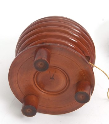Lot 82 - A 19th Century treen lignum vitae beehive...