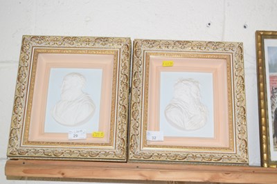 Lot 32 - A pair of reproduction plaster plaques John...