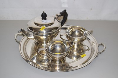 Lot 143 - A silver plated three piece tea set and...