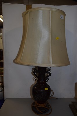Lot 202 - A Japanese bronzed metal table lamp