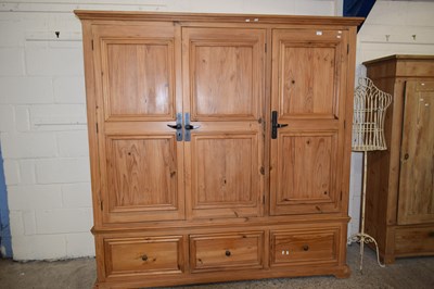 Lot 257 - Modern pine three door three drawer wardrobe