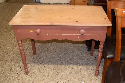 Lot 291 - A pine two drawer side table