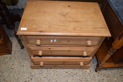 Lot 297 - A pine three drawer chest