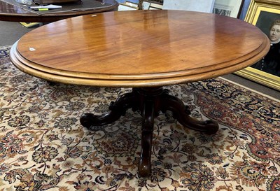 Lot 448 - A Victorian oval mahogany dining table raised...