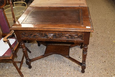Lot 325 - Small Victorian writing table with brown...