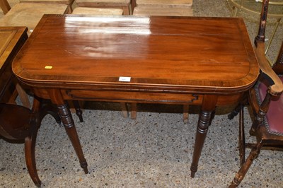 Lot 327 - A Georgian mahogany baize lined card table