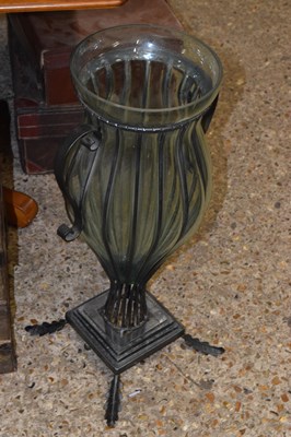 Lot 350 - A clear glass and iron framed floor vase