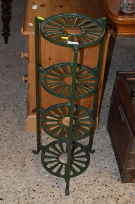 Lot 352 - An iron framed three tier saucepan stand