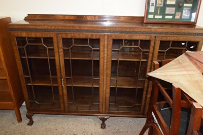 Lot 362 - A large Edwardian mahogany four door bookcase...