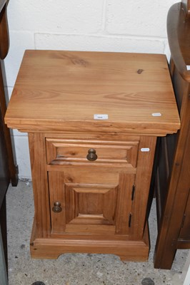 Lot 366 - A modern pine bedside cabinet