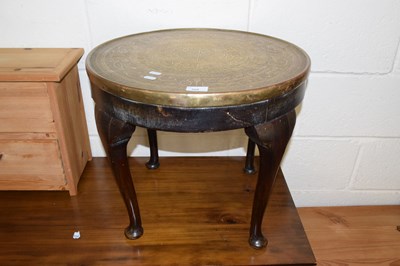 Lot 368 - A modern brass topped coffee table