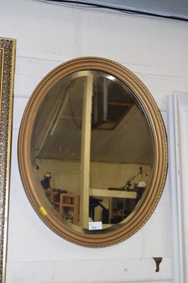 Lot 662 - Oval gilt framed wall mirror