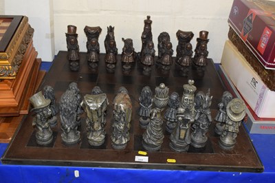 Lot 668 - A large Alice in Wonderland chess set
