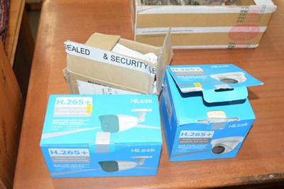 Lot 748 - Two boxes of security cameras and cables